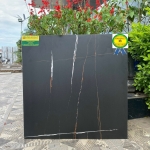 Gạch ốp lát 60x60 đá mờ liên doanh Việt Ấn màu đen vân cam 